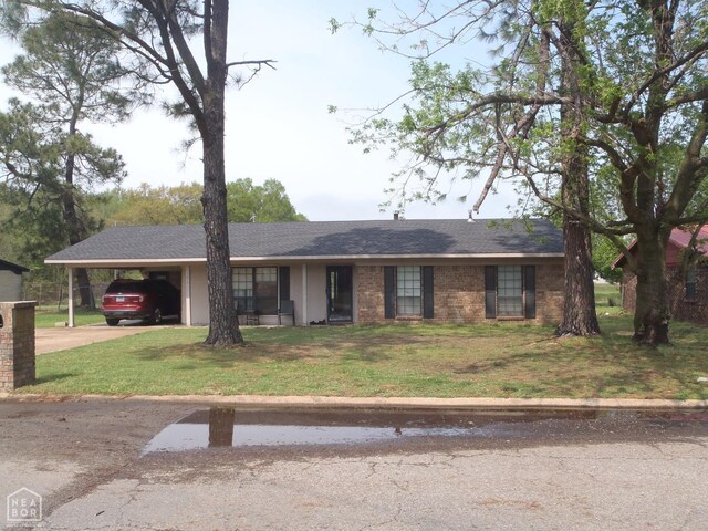 2009 Daugherty St, Newport, AR 72112 - carpeted living area featuring a ceiling fan and a textured ceiling
