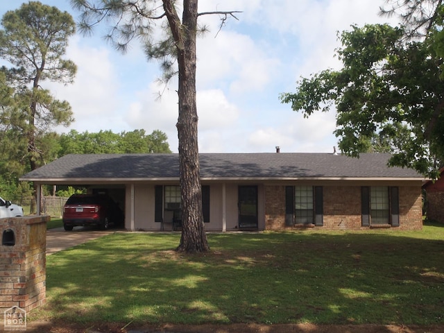 2009 Daugherty St, Newport, AR 72112 - ranch-style house with a front lawn and a carport