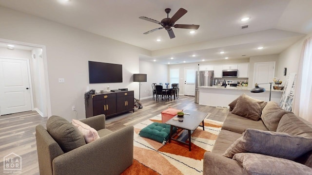 5632 Brookshire Dr, Jonesboro, AR 72405 - living area with recessed lighting, visible vents, a ceiling fan, baseboards, and light wood-style flooring