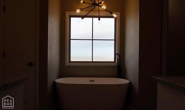 109 Old Eli Rd, Monette, AR 72447 - full bath with a chandelier and a freestanding bath