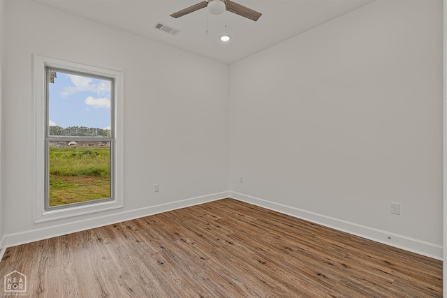 1816 N Oak, Brookland, AR 72417 - spare room with wood finished floors and a ceiling fan