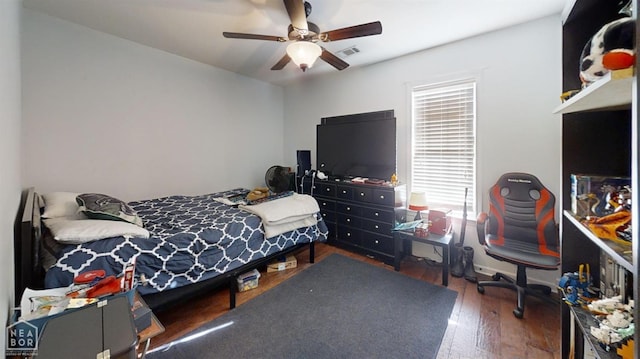 403 Brookstone Dr, Jonesboro, AR 72404 - bedroom featuring visible vents, ceiling fan, and wood finished floors