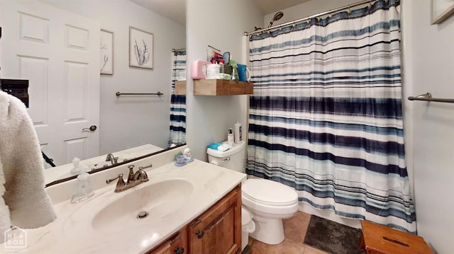 403 Brookstone Dr, Jonesboro, AR 72404 - bathroom with toilet, curtained shower, vanity, and tile patterned flooring