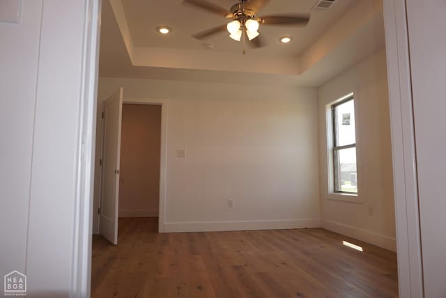311 Hollis Cv, Bono, AR 72416 - clothes washing area with baseboards, wood finished floors, laundry area, and hookup for an electric dryer