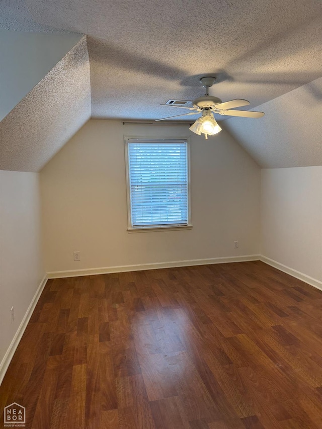 2704 Greenbriar Dr, Jonesboro, AR 72401 - bonus room with a textured ceiling, lofted ceiling, wood finished floors, and a ceiling fan