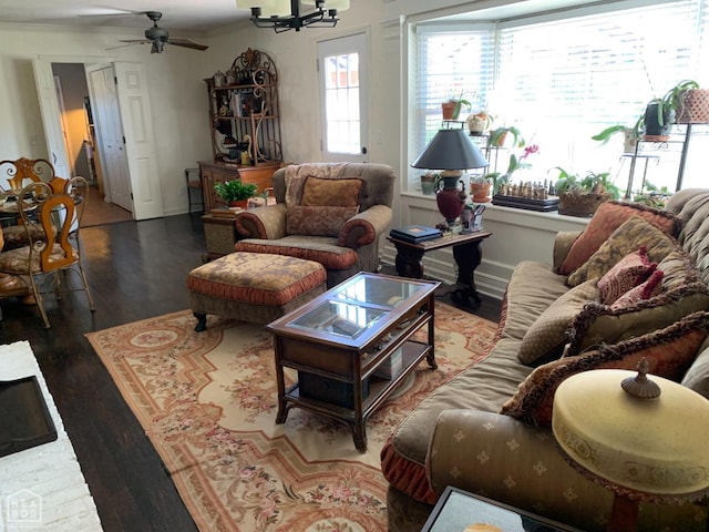 2704 Greenbriar Dr, Jonesboro, AR 72401 - living area with wood finished floors, a chandelier, and a ceiling fan