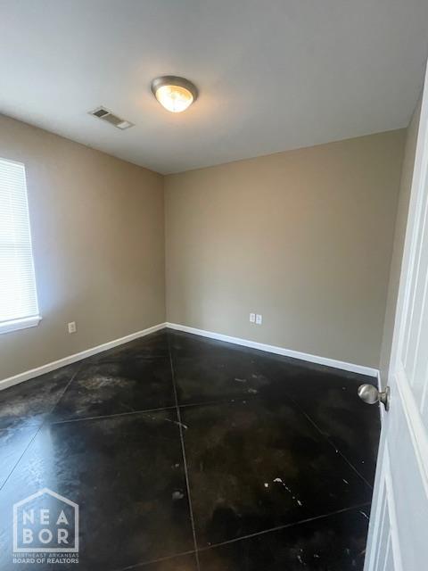 2206 Willow Rd, Jonesboro, AR 72401 - empty room with baseboards