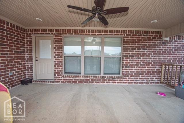 view of patio featuring ceiling fan
