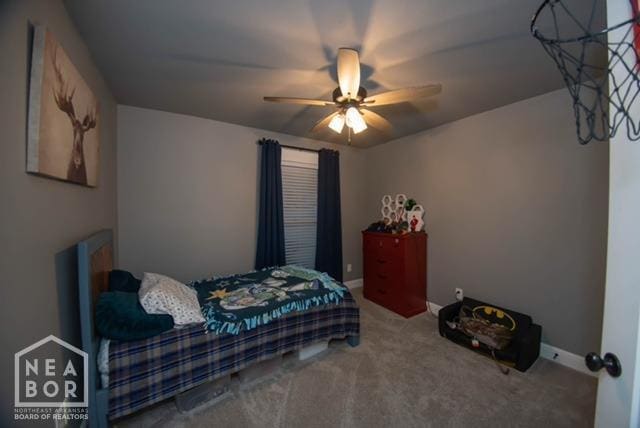 bedroom featuring ceiling fan, baseboards, and carpet floors
