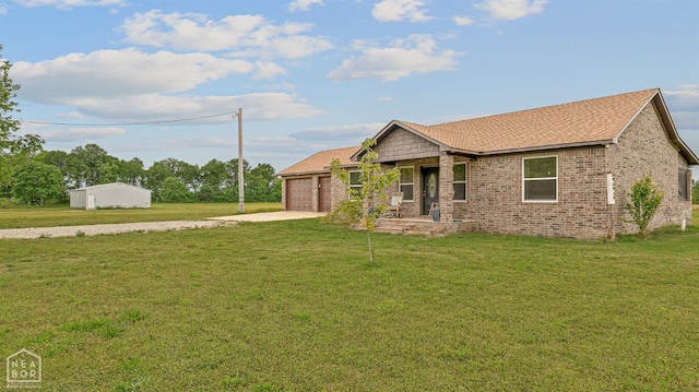 17603 Barry Ln, Trumann, AR 72472 - ranch-style home featuring driveway, an attached garage, a front yard, brick siding, and a shingled roof