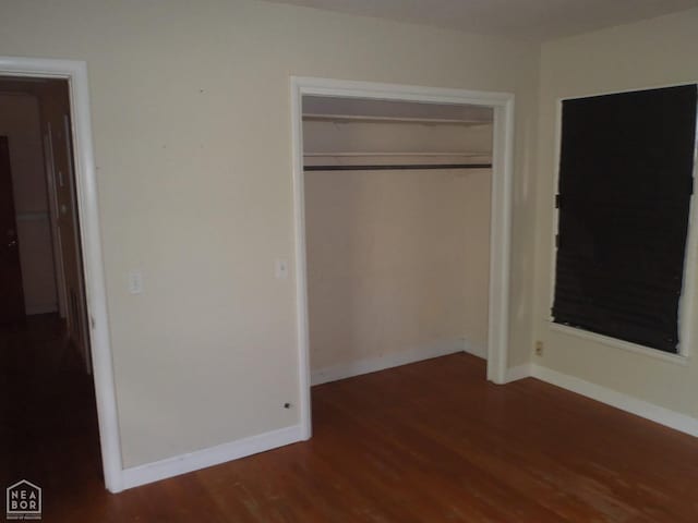 545 E Raney Ave, Mccrory, AR 72101 - unfurnished bedroom with wood finished floors and a closet