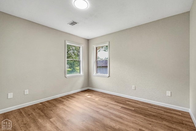 1615 Duncan Rd, Jonesboro, AR 72401 - spare room featuring wood finished floors