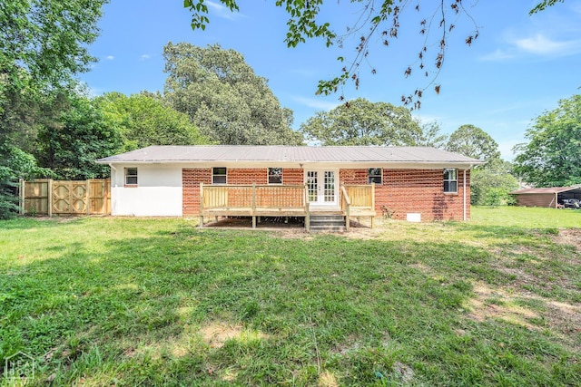 1615 Duncan Rd, Jonesboro, AR 72401 - rear view of property with french doors, a deck, brick siding, and a metal roof