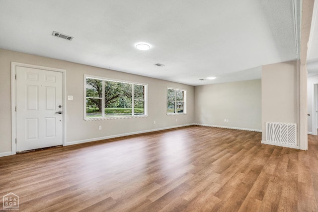 1615 Duncan Rd, Jonesboro, AR 72401 - unfurnished living room with wood finished floors and baseboards