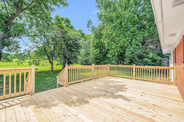 1615 Duncan Rd, Jonesboro, AR 72401 - wooden terrace with view of scattered trees