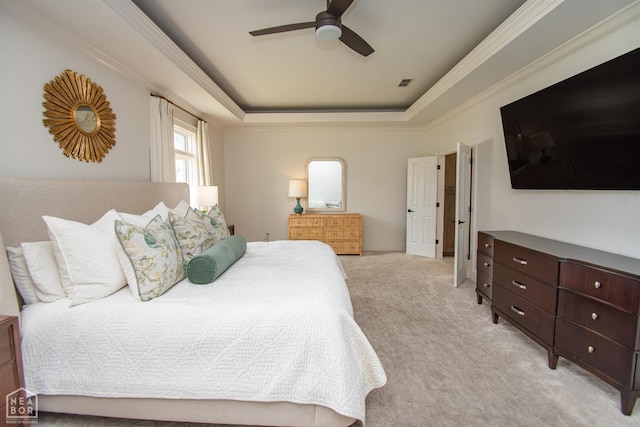 1203 Dove Rd, Jonesboro, AR 72401 - bedroom with light carpet, ceiling fan, visible vents, crown molding, and a tray ceiling