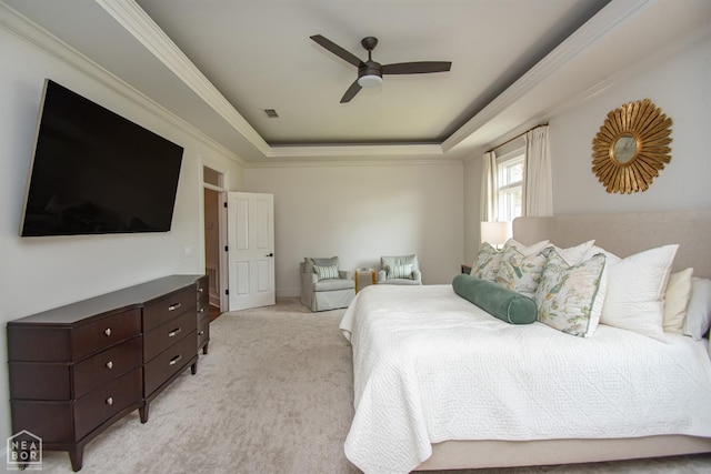 1203 Dove Rd, Jonesboro, AR 72401 - bedroom featuring a raised ceiling, a ceiling fan, crown molding, and light colored carpet