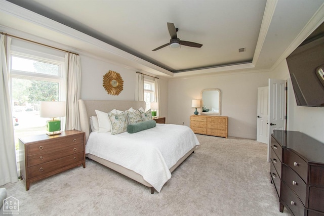 1203 Dove Rd, Jonesboro, AR 72401 - bedroom with crown molding, light colored carpet, a raised ceiling, visible vents, and a ceiling fan