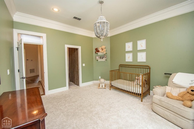 1203 Dove Rd, Jonesboro, AR 72401 - carpeted bedroom featuring an inviting chandelier, visible vents, and ornamental molding