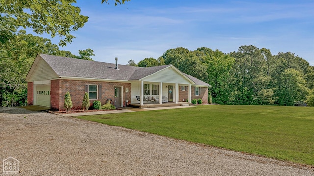 1766 Greene Road 326, Bono, AR 72416 - ranch-style home with covered porch, driveway, brick siding, a garage, and a front yard
