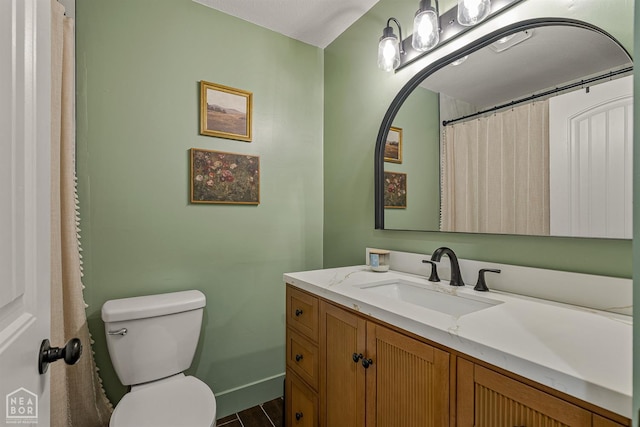 1766 Greene Road 326, Bono, AR 72416 - bathroom with vanity, toilet, and baseboards