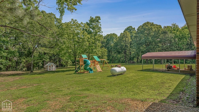 1766 Greene Road 326, Bono, AR 72416 - view of jungle gym with a yard and an outbuilding