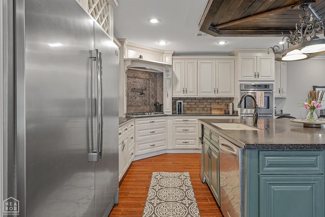 1616 Neely Rd, Jonesboro, AR 72404 - kitchen featuring stainless steel appliances, a sink, recessed lighting, and white cabinetry