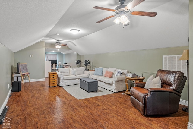 1616 Neely Rd, Jonesboro, AR 72404 - living area featuring baseboards, vaulted ceiling, wood finished floors, and ceiling fan