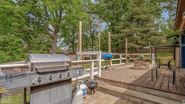 1616 Neely Rd, Jonesboro, AR 72404 - wooden terrace featuring a fenced backyard