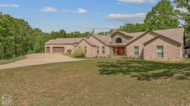 1616 Neely Rd, Jonesboro, AR 72404 - single story home featuring brick siding, an attached garage, driveway, and a front lawn