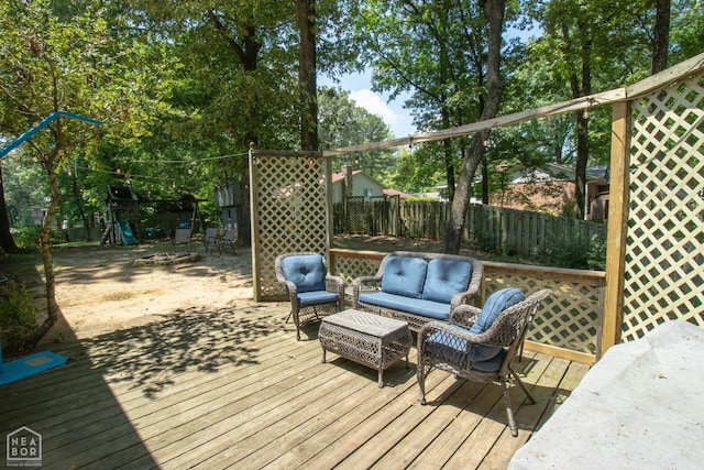 1705 Loberg Ln, Jonesboro, AR 72401 - wooden deck with outdoor lounge area and a playground