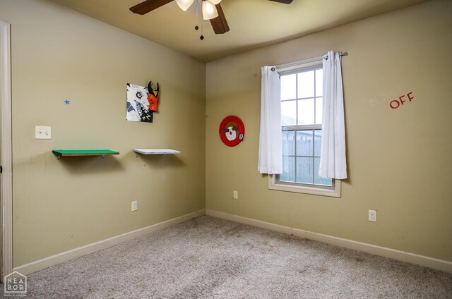 103 Hollis Cv, Bono, AR 72416 - spare room with a ceiling fan, carpet floors, and baseboards