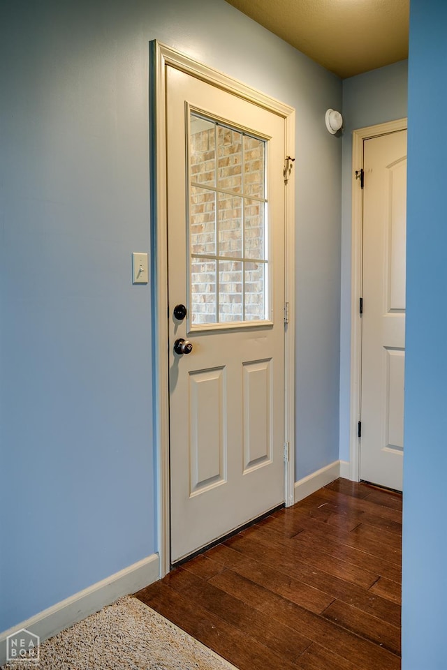 103 Hollis Cv, Bono, AR 72416 - entryway featuring wood finished floors and baseboards