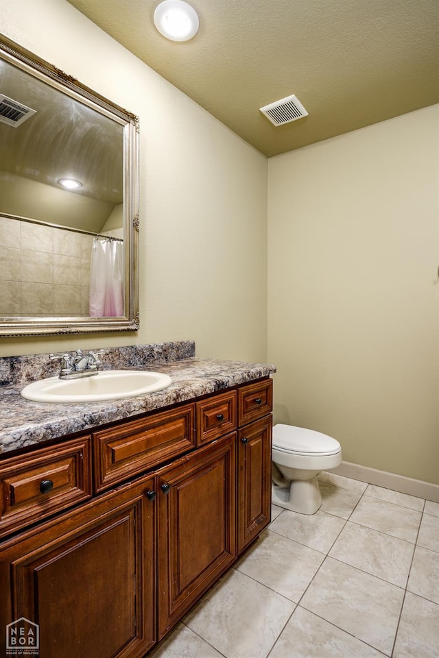 103 Hollis Cv, Bono, AR 72416 - full bath with tile patterned floors, vanity, and toilet