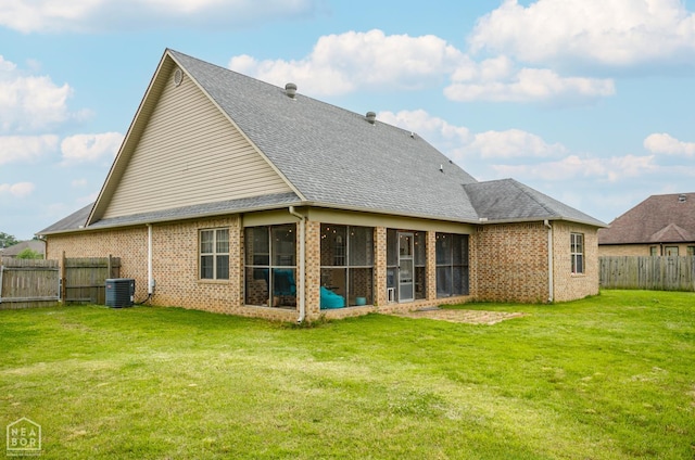 103 Hollis Cv, Bono, AR 72416 - rear view of house featuring brick siding, a sunroom, cooling unit, and roof with shingles