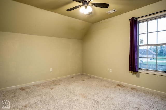 103 Hollis Cv, Bono, AR 72416 - bonus room with baseboards, carpet, vaulted ceiling, ceiling fan, and healthy amount of natural light