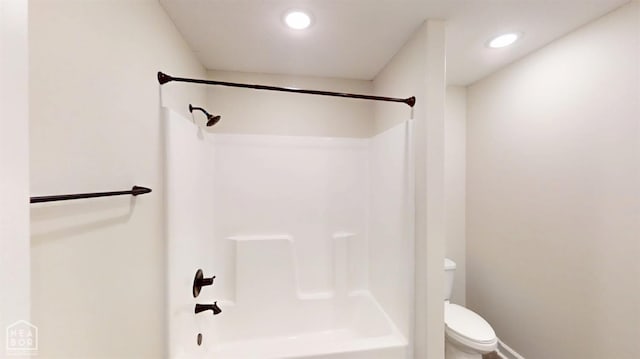 full bathroom with recessed lighting, baseboards, toilet, and tub / shower combination