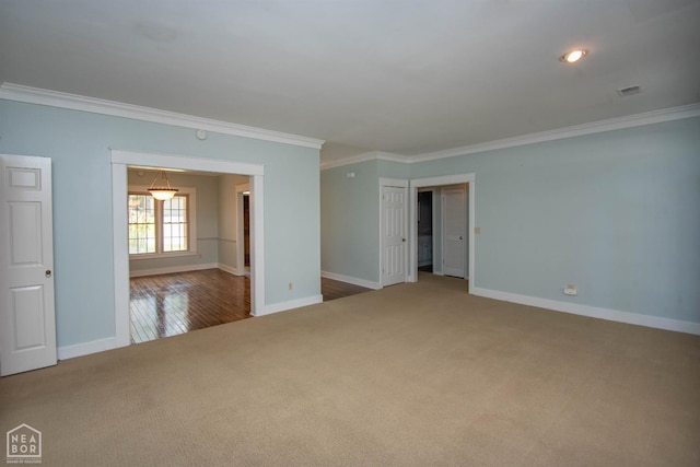 2205 Oak Hollow Ln, Jonesboro, AR 72401 - carpeted empty room with ornamental molding and baseboards