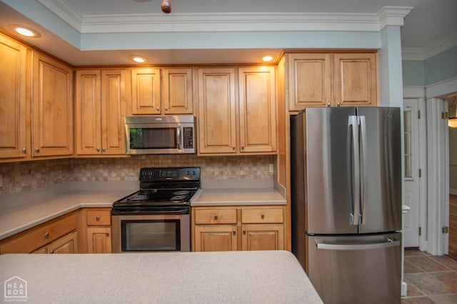 2205 Oak Hollow Ln, Jonesboro, AR 72401 - kitchen featuring stainless steel appliances, crown molding, decorative backsplash, and light countertops