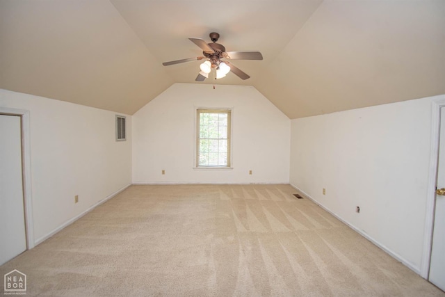 2205 Oak Hollow Ln, Jonesboro, AR 72401 - bonus room featuring a ceiling fan, light carpet, and vaulted ceiling