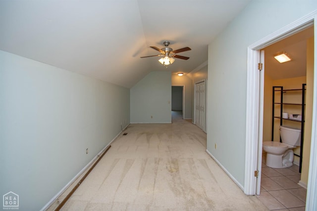 2205 Oak Hollow Ln, Jonesboro, AR 72401 - additional living space featuring ceiling fan, vaulted ceiling, and light carpet