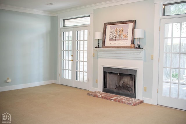2205 Oak Hollow Ln, Jonesboro, AR 72401 - unfurnished living room featuring ornamental molding, carpet, a brick fireplace, and french doors