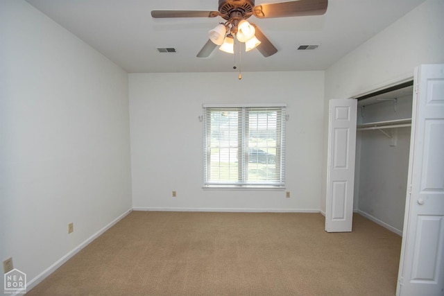 2205 Oak Hollow Ln, Jonesboro, AR 72401 - unfurnished bedroom featuring light carpet, a closet, and ceiling fan