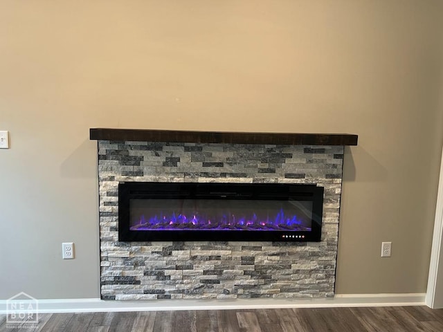 5743 Brookshire Dr, Jonesboro, AR 72401 - detailed view of a glass covered fireplace and wood finished floors