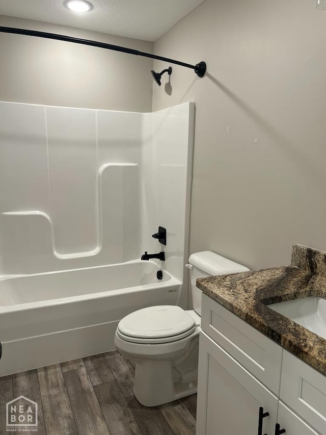 5743 Brookshire Dr, Jonesboro, AR 72401 - full bathroom with vanity, wood finished floors, and shower / bath combination