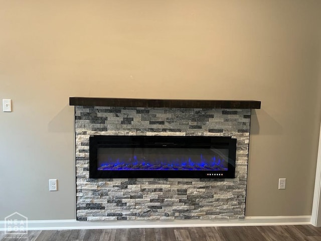5743 Brookshire Dr, Jonesboro, AR 72401 - detailed view of wood finished floors and a stone fireplace
