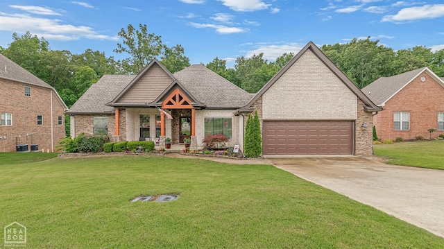 view of front of home with concrete driveway, a front yard, a garage, brick siding, and a shingled roof