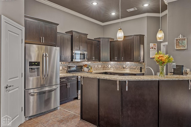 kitchen featuring stainless steel appliances, crown molding, backsplash, dark brown cabinetry, and recessed lighting