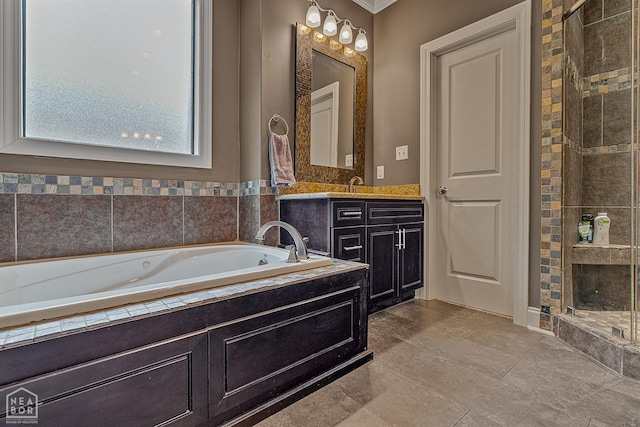 full bath with a garden tub, vanity, and a stall shower