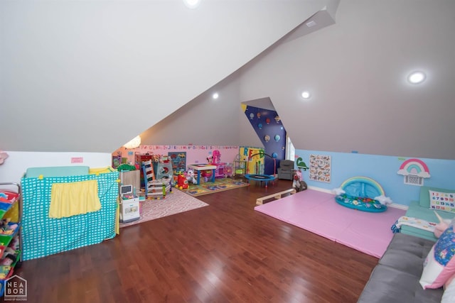rec room featuring wood finished floors, vaulted ceiling, and recessed lighting